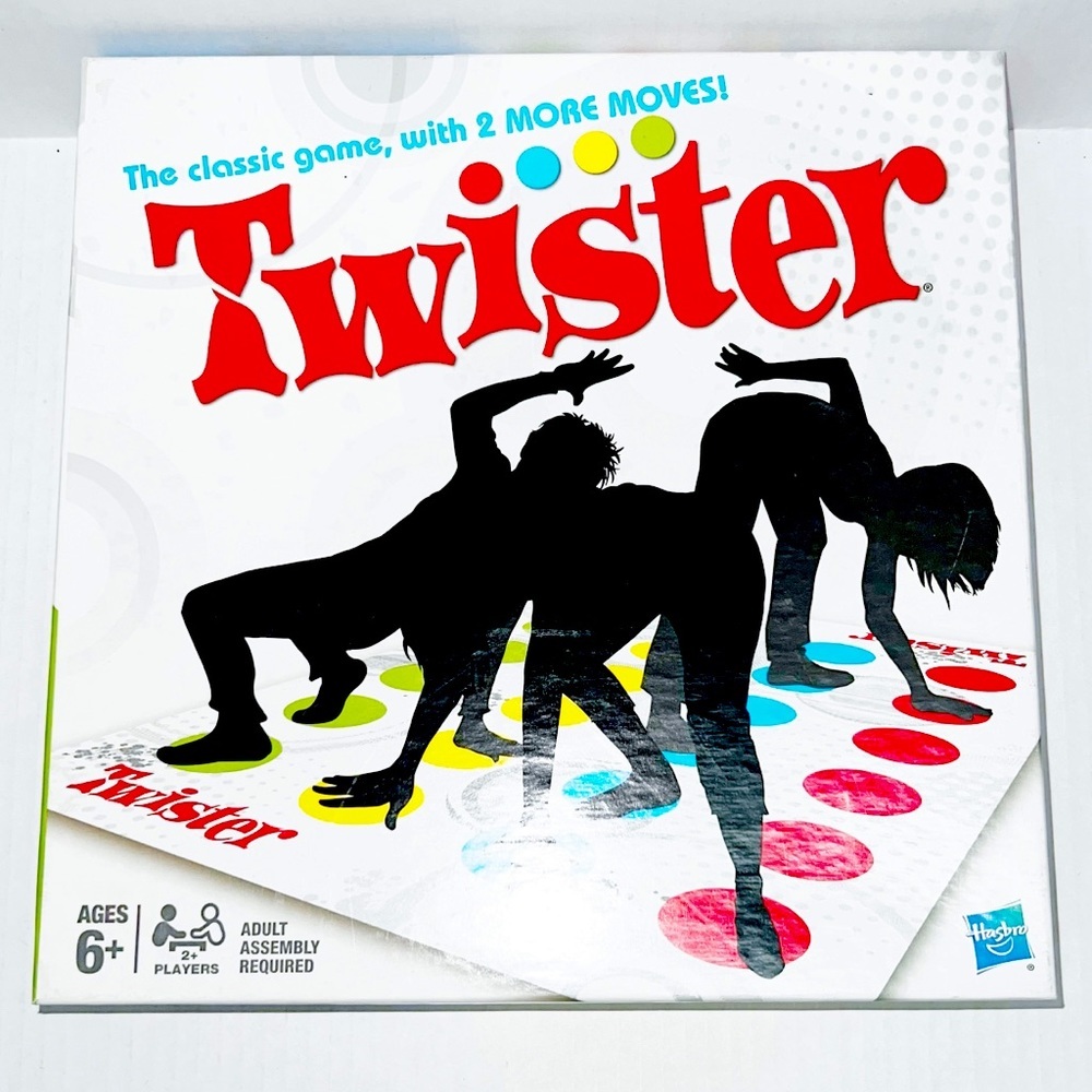 - 2012 Twister by Hasbro - The Classics Game With Two More Moves